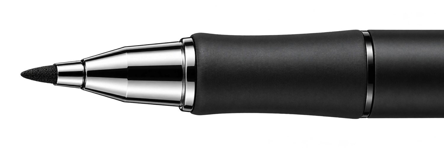 Close view of a fine black felt fibre nib in a polished chrome housing, with a matte black pen grip